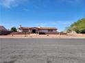 Inviting single-story home with a xeriscaped yard and charming brick embellishments at , Henderson, NV 89015