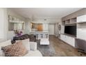 Well-lit living area showcases open-concept design, breakfast bar, built-in storage, and neutral color palette at 222 Karen Ave # 3104, Las Vegas, NV 89109