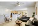 Cozy living room flows into a dining area and kitchen, creating an open and inviting living space at 6255 W Arby Ave # 118, Las Vegas, NV 89118