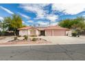 Charming single-story home with a well-manicured front yard and a three car garage at 6582 Cartgate Ct, Las Vegas, NV 89110