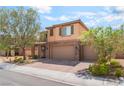 Charming two-story home with desert landscaping, brown exterior, and convenient three-car garage at 7761 Boyd Ave, Las Vegas, NV 89179