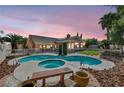 Beautiful backyard oasis with a sparkling pool and ample space for entertaining at 8216 W Hammer Ln, Las Vegas, NV 89149