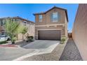 Beautiful two-story home featuring a well-maintained front yard, a two-car garage, and a private driveway at 8783 Halcon Ave, Las Vegas, NV 89148