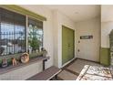 Welcoming entryway featuring a gated porch and neutral colored walls and tile at 916 Bob Barney Ave, North Las Vegas, NV 89086