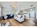 A spacious living room with an open layout and direct access to the kitchen area at 10550 W Alexander Rd # 2179, Las Vegas, NV 89129