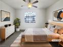 Relaxing main bedroom showcasing a stylish bed, tasteful decor, and ample natural light at 1405 S Nellis Blvd # 2087, Las Vegas, NV 89104
