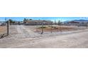 Large fenced yard offering privacy and security for outdoor enjoyment at 3611 W Horn Rd, Pahrump, NV 89048