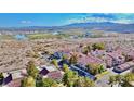 Stunning aerial view of the Laughlin Bay Village community, set against a backdrop of mountains and a winding river at 3740 Desert Marina Dr # 12, Laughlin, NV 89029