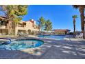 Enjoy a refreshing swim in this sparkling community pool and spa area with plenty of seating at 3740 Desert Marina Dr # 12, Laughlin, NV 89029
