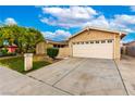 Lovely single-story home showing a large two-car garage and an inviting front yard at 3905 Cherokee Ave, Las Vegas, NV 89121