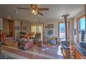 Spacious living room with windows and tile flooring offers ample natural light at 481 Jarvis Rd, Pahrump, NV 89060
