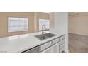 Spacious kitchen with stainless steel appliances, double sink, and lots of countertop space at 6250 W Flamingo Rd # 51, Las Vegas, NV 89103