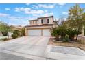 Charming home featuring desert landscaping and a convenient two-car garage at 10143 Canyon Hills Ave, Las Vegas, NV 89148