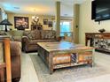 Inviting living room with comfortable seating, stylish decor, and neutral colors at 1121 Majestic Canyon St, Henderson, NV 89052