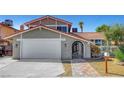 Charming home with a two-car garage and unique gated front entrance at 3791 El Camino Rd, Las Vegas, NV 89103