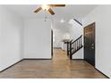 Bright living room boasts modern wood-look flooring and direct access to other rooms at 4517 Lime Straight Dr, Las Vegas, NV 89115
