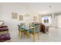 Bright dining area with glass table, seating for four, and ample natural light at 653 Mountain Rdg, Mesquite, NV 89027