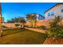 Serene backyard featuring lush landscaping, perfect for enjoying outdoor leisure at 6546 American Flower St, Las Vegas, NV 89148