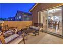 Cozy balcony with outdoor seating, perfect for relaxing and enjoying the evening at 6546 American Flower St, Las Vegas, NV 89148