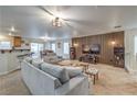 Spacious living room with modern decor, stylish furniture, and an open-concept layout at 6546 American Flower St, Las Vegas, NV 89148