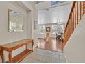 Inviting foyer leading into the dining area and living space, with elegant decor at 9009 Ochoa St, Las Vegas, NV 89143