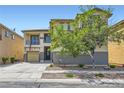 Charming two-story home with a one-car garage, and a balcony at 9413 Steeltree St, Las Vegas, NV 89143