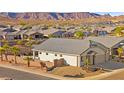 Desirable home in a scenic community, complete with mature landscaping and mountain backdrop at 1357 Manassas Rdg Rdg, Mesquite, NV 89027