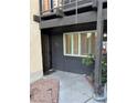 View of the front door and entrance with a secure gate and well-maintained walkway at 1370 Vegas Valley Dr # 47, Las Vegas, NV 89169