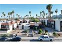 A charming complex with palm trees and inviting architecture offers a serene urban living environment at 1405 Vegas Valley Dr # 257, Las Vegas, NV 89169