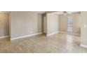 Bright living room with neutral walls and tile flooring, offering a versatile space for relaxation and entertainment at 1405 Vegas Valley Dr # 257, Las Vegas, NV 89169