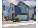 Well-maintained two-story home with a two-car garage and paved driveway at 3767 Paseo De Paz Ave, Las Vegas, NV 89115