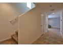 Entryway with stairs, neutral walls, and tile leading to the main living area at 4905 Quiet Morning St, Las Vegas, NV 89122