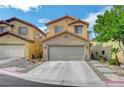 Charming home with a two-car garage and well-maintained landscaping, providing an attractive exterior view at 722 Chepstow Ave, Las Vegas, NV 89178