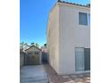 The backyard featuring a small storage shed and patio, great for outdoor relaxation at 8328 Cimarron Ridge Dr, Las Vegas, NV 89128