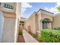 Close up of front entrance showing address number and secured courtyard at 8904 Evening Star Dr, Las Vegas, NV 89134
