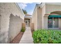 View of front entrance with covered walkway to secured courtyard at 8904 Evening Star Dr, Las Vegas, NV 89134