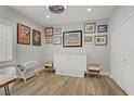 Cozy bedroom with hardwood floors, murphy bed, and closet at 11249 Revelry Ln, Las Vegas, NV 89138