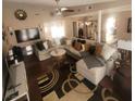 Bright living room with hardwood floors, neutral colors, and modern decor at 3920 Autumn St, Las Vegas, NV 89120