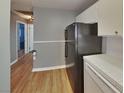 Kitchen area with modern appliances and light-colored cabinetry at 5043 Spencer St # A, Las Vegas, NV 89119