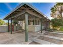 A spacious carport with sturdy support beams offering ample covered parking and protection from the elements at 709 New Mexico St, Boulder City, NV 89005
