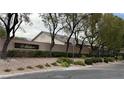 Elegant Belvedere community sign surrounded by mature trees and landscaping at 129 Sapodilla Ln, Las Vegas, NV 89144