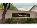 Close-up of the Belvedere community sign with manicured bushes at 129 Sapodilla Ln, Las Vegas, NV 89144