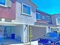Well-maintained home featuring an attached garage, desert landscaping and a blue Jeep at 20 Barbara Ln # 47, Las Vegas, NV 89183