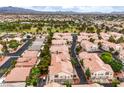 Serene aerial perspective of a well-maintained community with tree-lined streets and desert landscaping at 7450 S Eastern Ave # 2073, Las Vegas, NV 89123