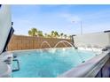 Unwind in this backyard hot tub, complete with water features for added relaxation at 8016 Carpenter Creek Ave, Las Vegas, NV 89113