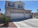 Well maintained home with a spacious 3-car garage, and desert landscaping at 9232 Marlia St, Las Vegas, NV 89123