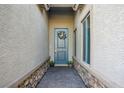 Close-up of the front entrance showcasing a stylish door, stone accents, and a welcoming walkway at 961 Cutter St, Henderson, NV 89011