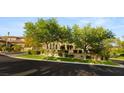 Charming home with mature trees, manicured lawn and landscaped garden at 1200 Dry Point Ct, Las Vegas, NV 89144