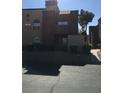 Attractive exterior with multiple units and mature landscaping at 4050 Pacific Harbors Dr # 217, Las Vegas, NV 89121