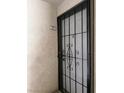 Close-up of the front door featuring a secure screen door at 2606 S Durango Dr # 171, Las Vegas, NV 89117